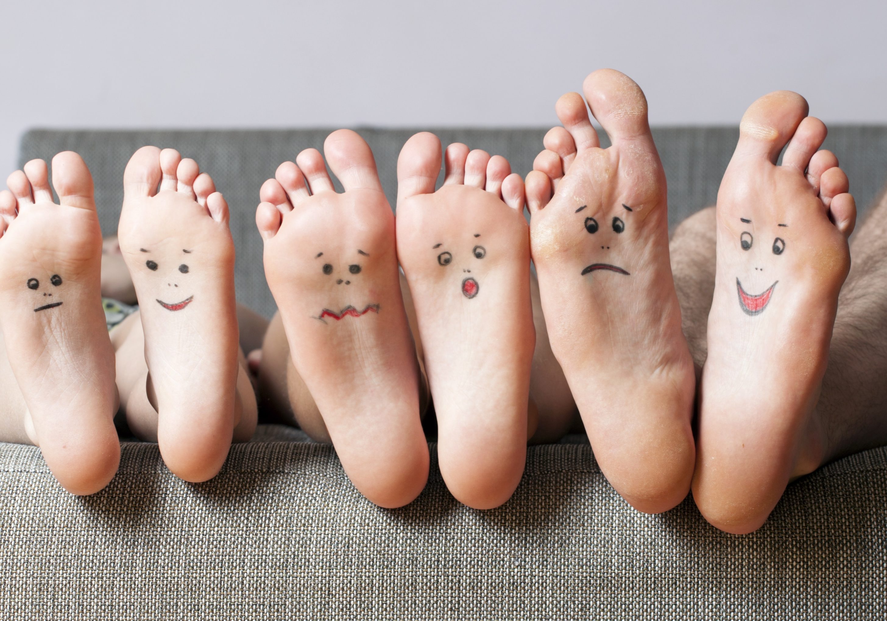 Close up of human soles with smiles